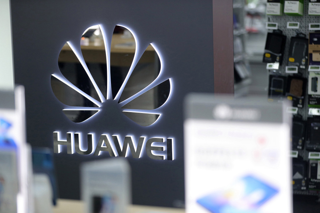 Justice Department files criminal charges against Huawei