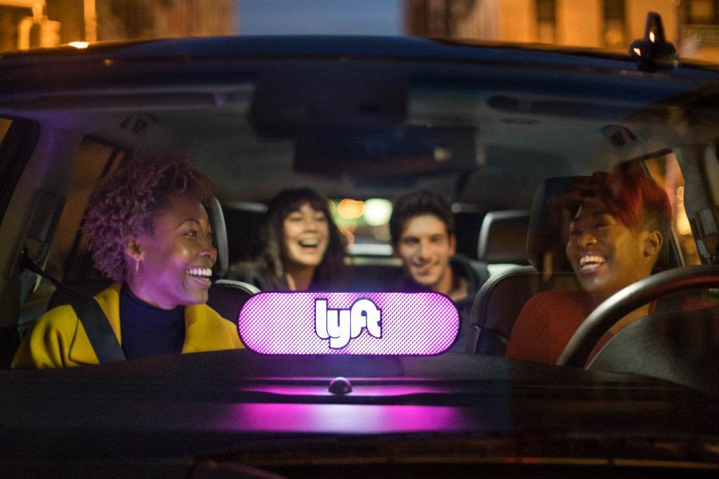 Lyft takes a hit after ride-hailing company sees more losses ahead