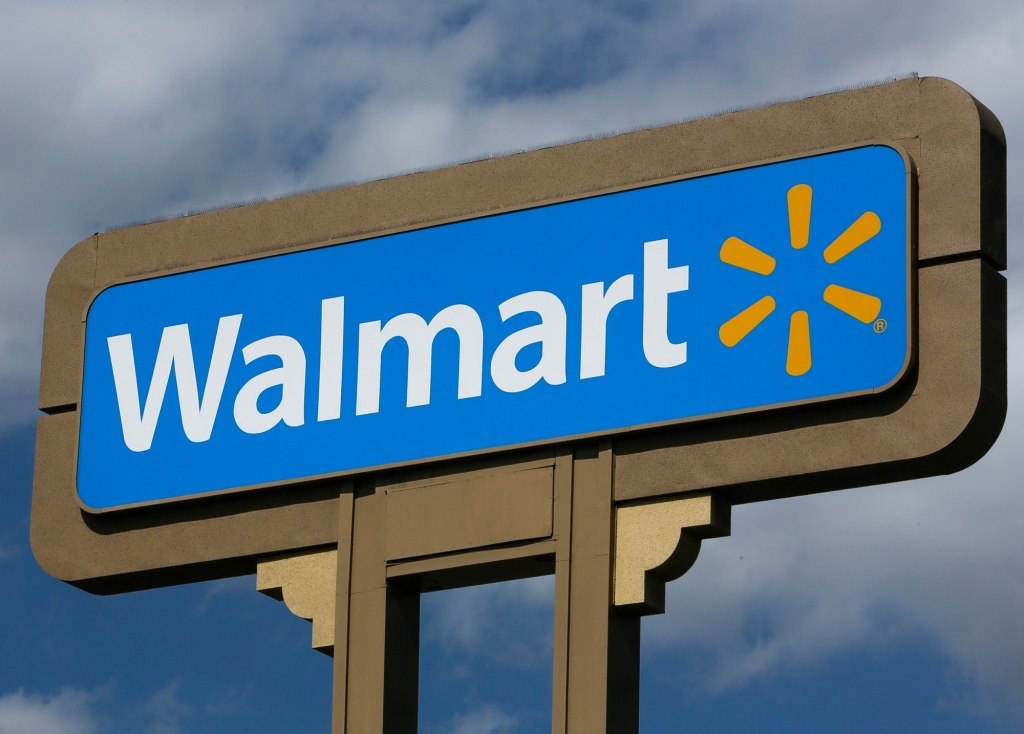 Walmart halves paid leave for workers with Covid after CDC shift
