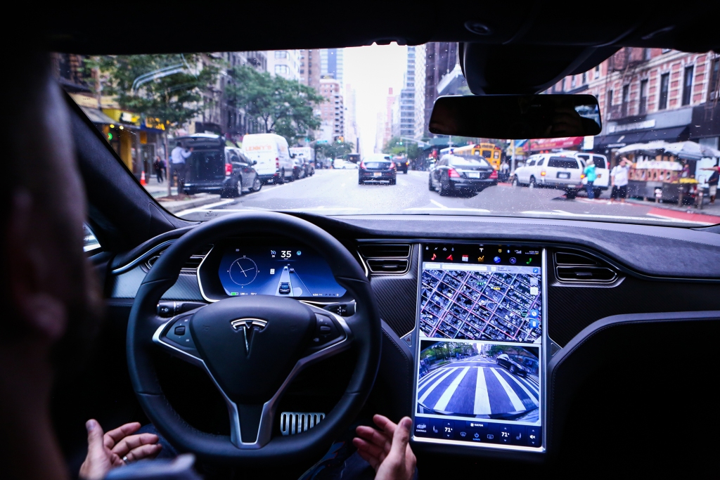 Tesla raising price of driver-assistance system to $15,000