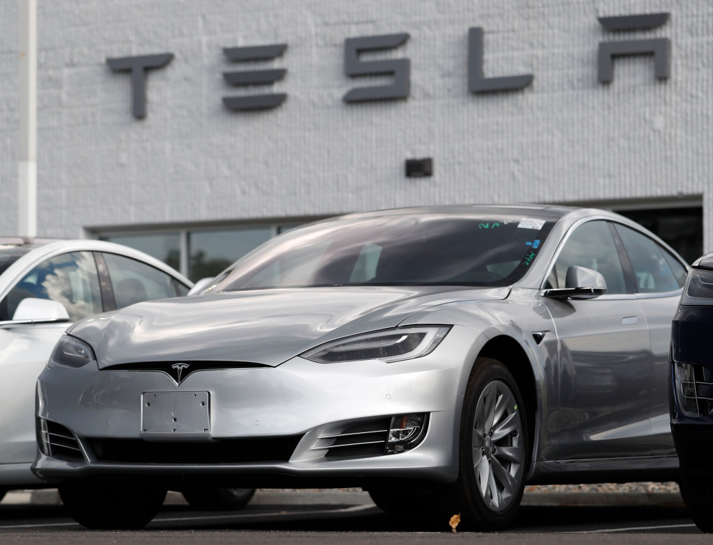 As year ends, Tesla tax credits set to be cut in half