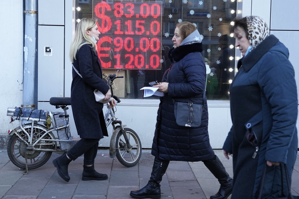 Ruble plummets as sanctions against Russia take hold