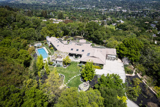 Stunning Danville hilltop estate offers a private oasis with lush gardens and spectacular Mt. Diablo views
